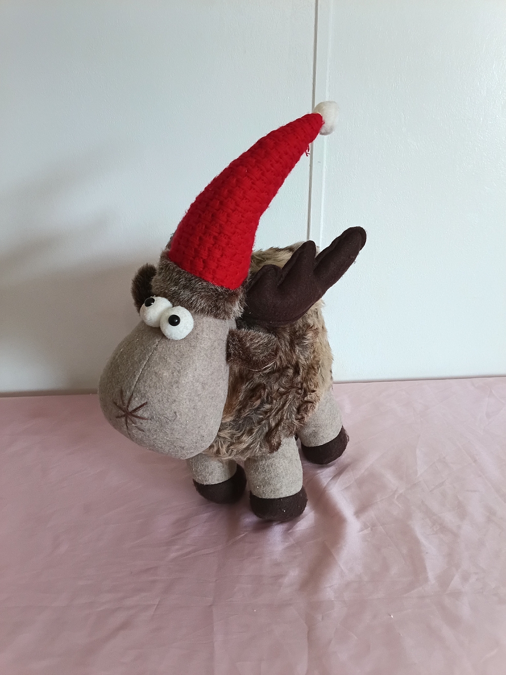Bug-eyed Whimsical Reindeer With Red Santa Hat